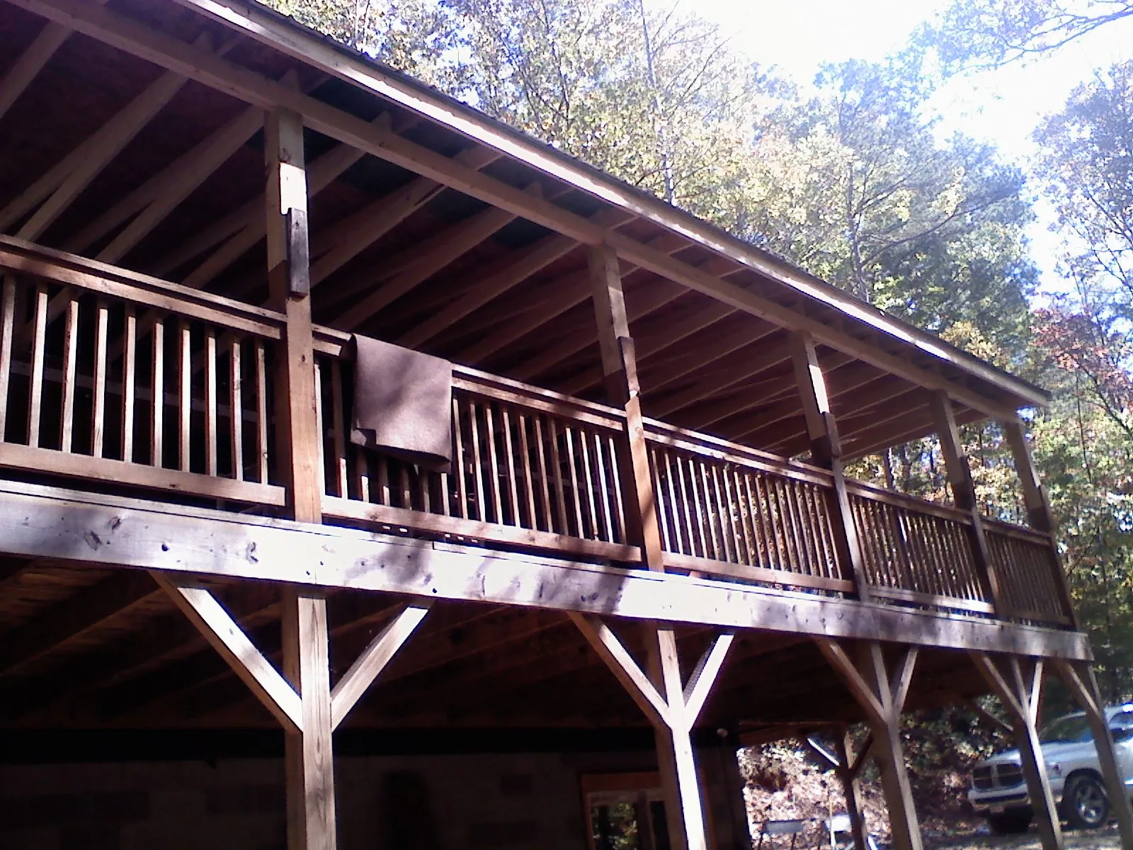 Timber framing under a new elevated porch and deck — Roof Leak Repair in Rehoboth by Roofing Brothers